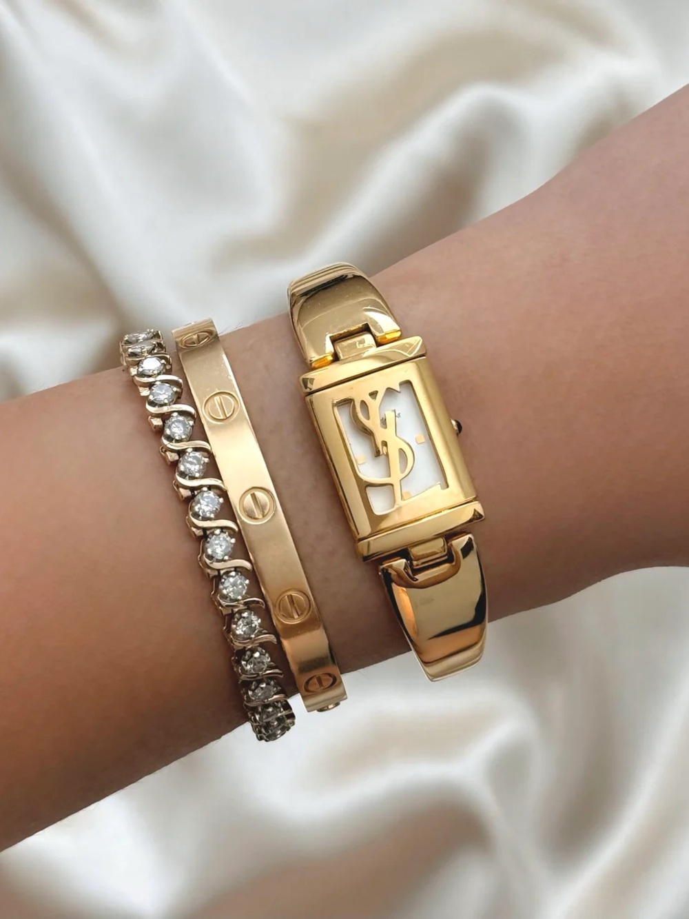 AUTHENTIC VINTAGE YVES SAINT LAURENT GOLD LIMITED EDITION HIDDEN WATCH